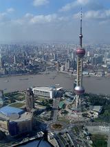 High Angle View of Oriental Pearl TV Tower on Lujiazui with View of Huangpu River and Sprawling Metropolis of Shanghai, China Under Sunny Blue Sky